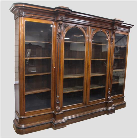 A Victorian ebony banded oak breakfront library bookcase, W.10ft D.1ft 9in. H.7ft 3in.